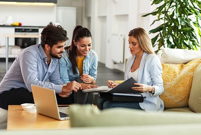 Female Real Estate agent offer home ownership and life insurance
